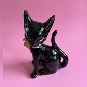 Vintage black, porcelain cat with yellow bowtie. Excellent used condition.